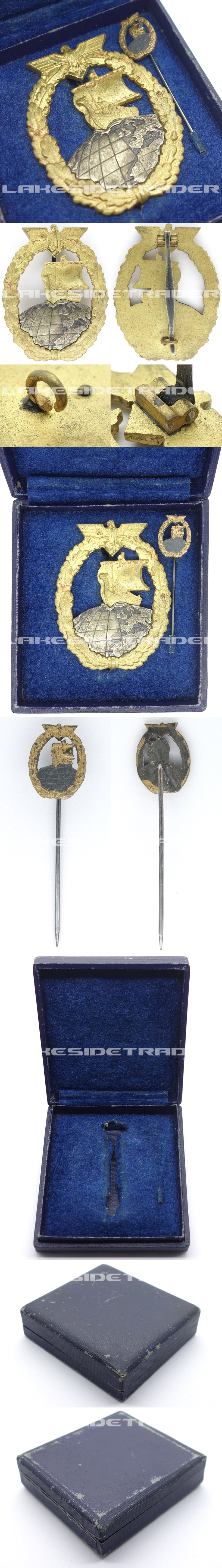 Cased Auxiliary Cruiser Badge and Miniature