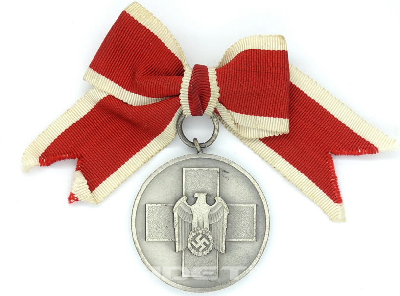 4th Class Social Welfare Medal on Female's Ribbon Bow